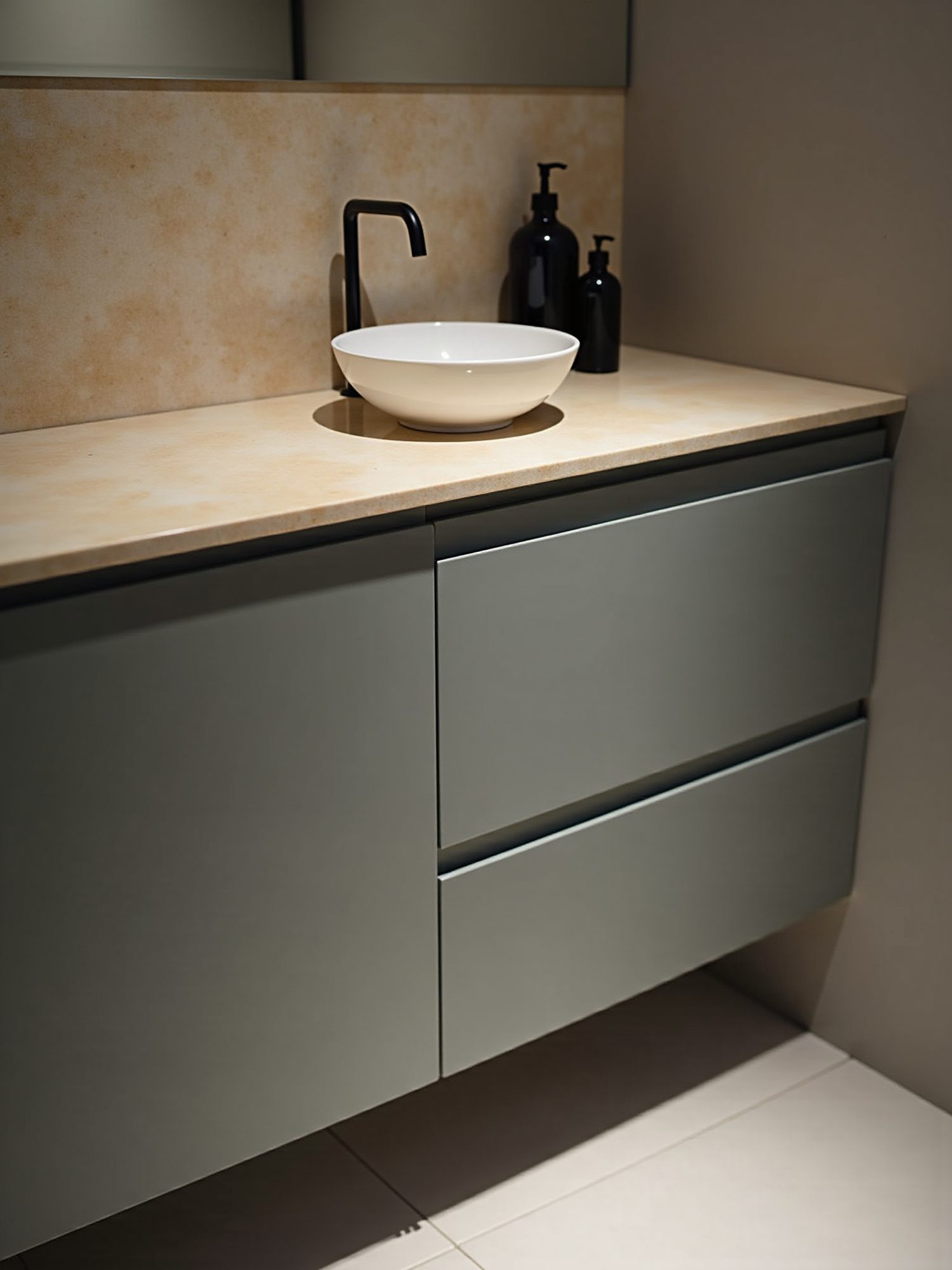 A bathroom vanity with a vessel sink on a warm wood countertop